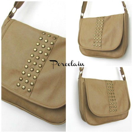 Art 1028 Cartera en ecocuero con tachas $250